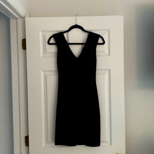 Black mini dress above the knee